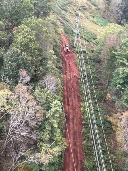 Blue Ridge Energy is building our own roads where possible to reach damaged locations washed out by flooding. 