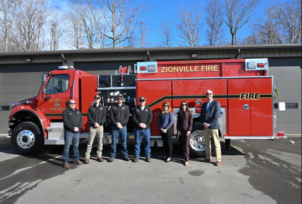 Zionville Volunteer Fire Department officials with Blue Ridge Energy CEO Katie Woodle, Director of Community Relations and Economic Development Tasha Rountree and COO Alan Merck